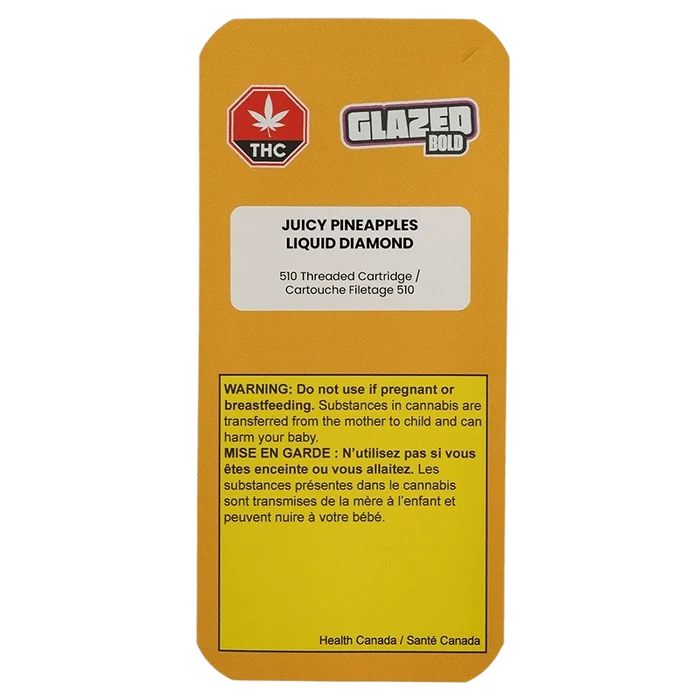 Portrait view of the mustard-yellow package labeled Juicy Pineapples Liquid Diamond Vape Cartridge with warning block and Glazed Bold logo.