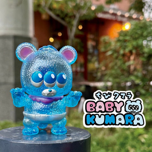Baby Kumara - CollectedCon Edition by MoMoo Kuma, a limited-edition sofubi toy bear with three eyes, measuring 6.5x7.5x5.7cm.