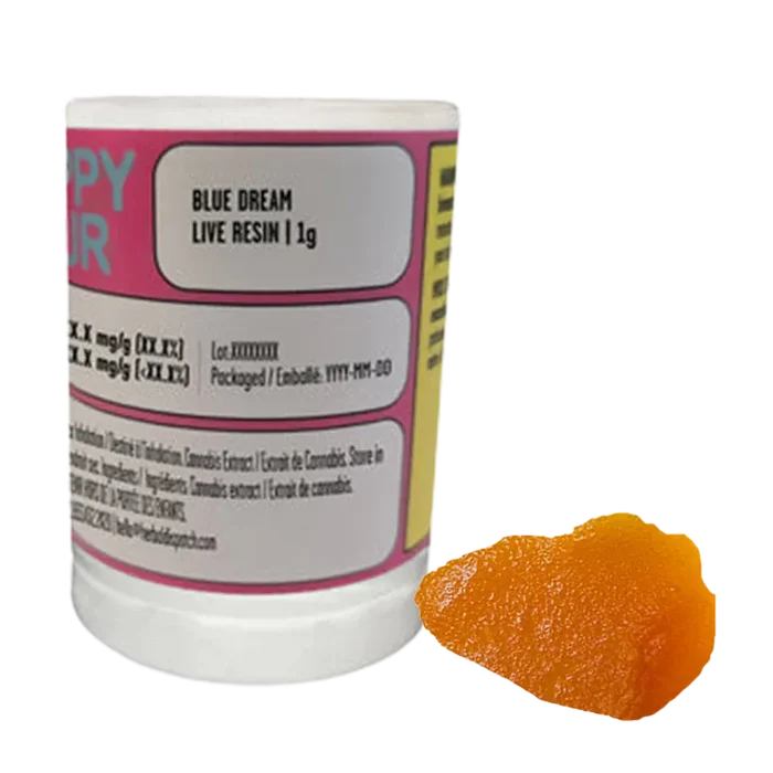 White background product shot showing a jar labeled Blue Dream Live Resin 1 g on the left with an amber-orange resin piece to its right.