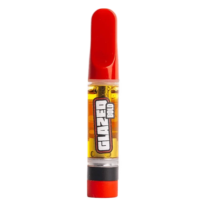Straight-on view of the Juicy Pineapples Liquid Diamond Vape Cartridge with its red mouthpiece and amber-filled chamber centered on a white background