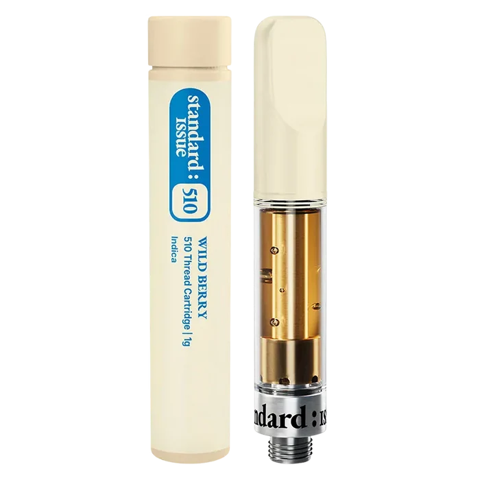 Close-up front view of the Wild Berry Vape Cartridge showing a clear glass cartridge with gold interior components beside its cream-colored 1 g tube.